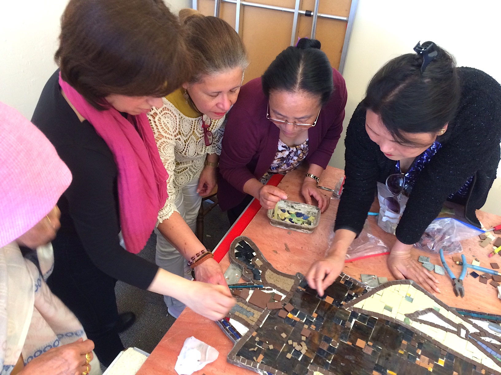 multi ethnic group making a mosaic