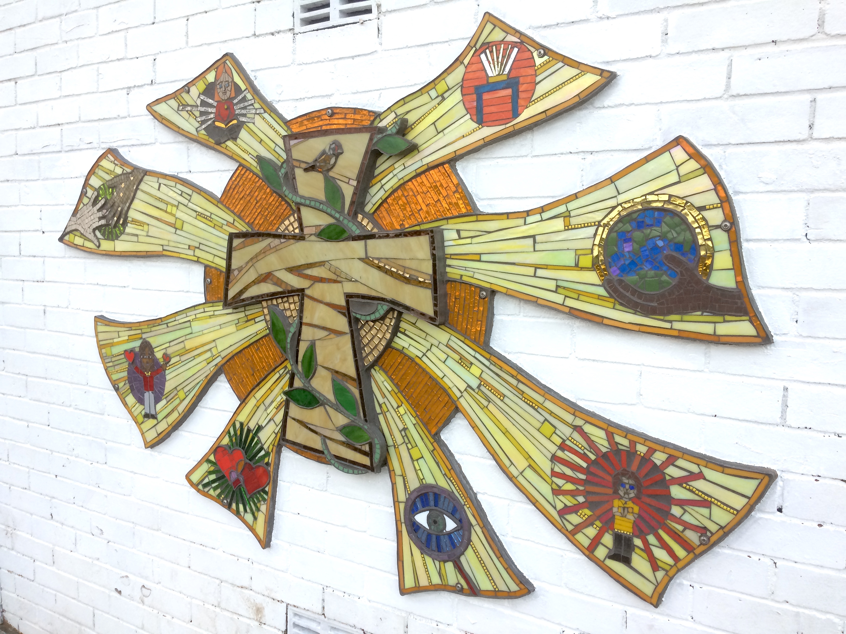 mosaic of cross and aspects of school life