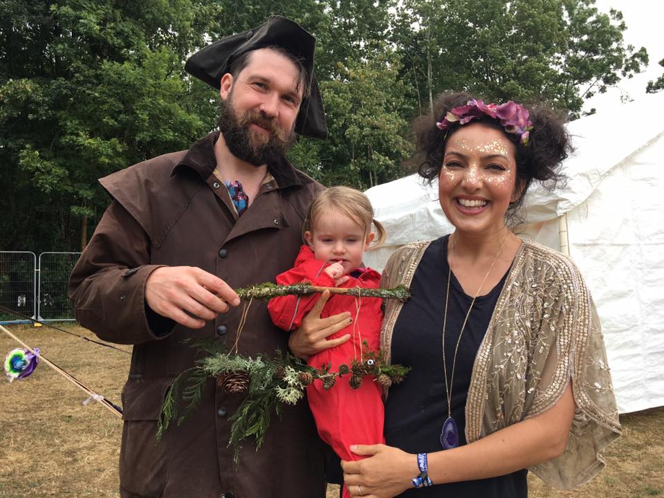 Family with young child after a workshop looking very happy