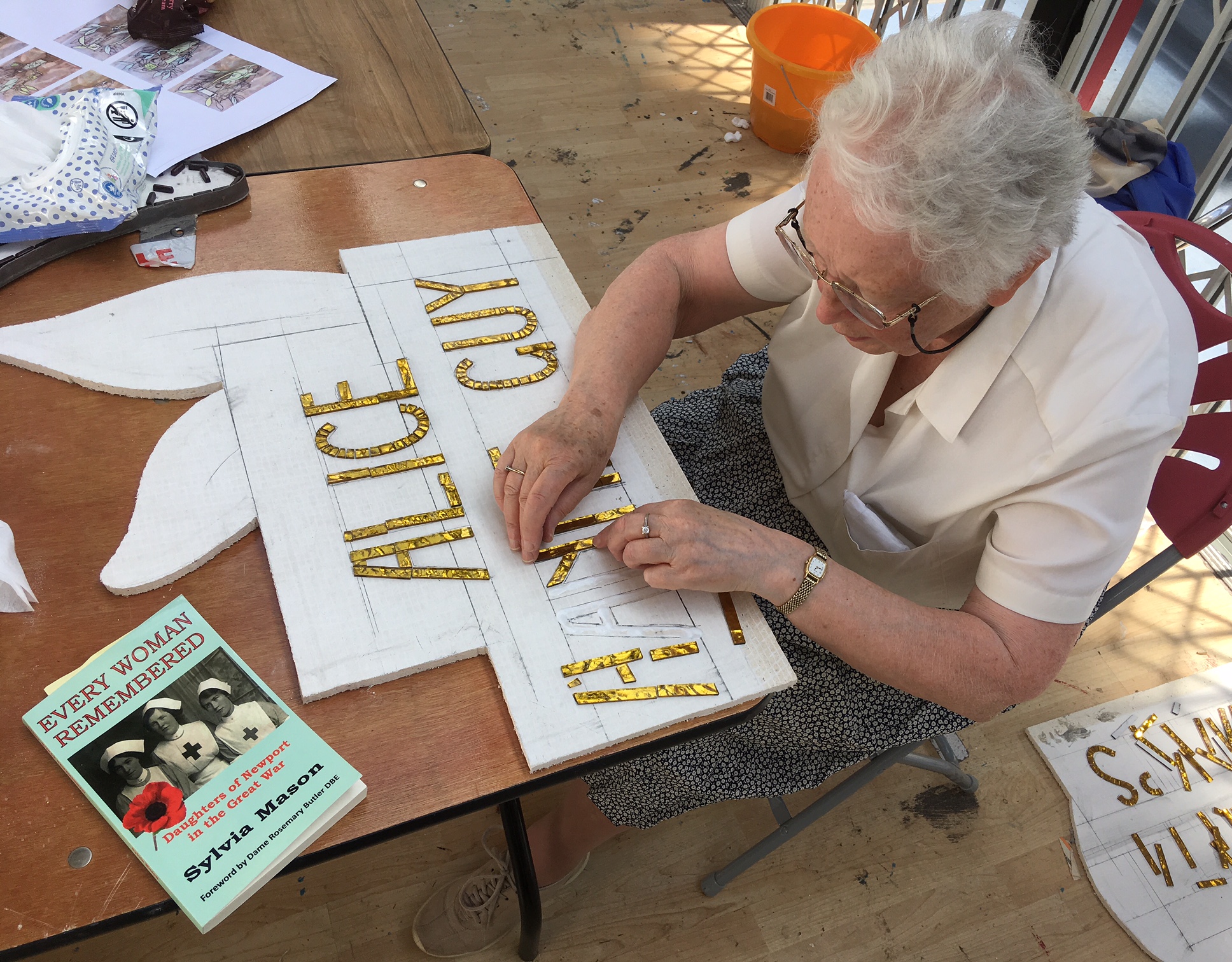 women making a mosaic