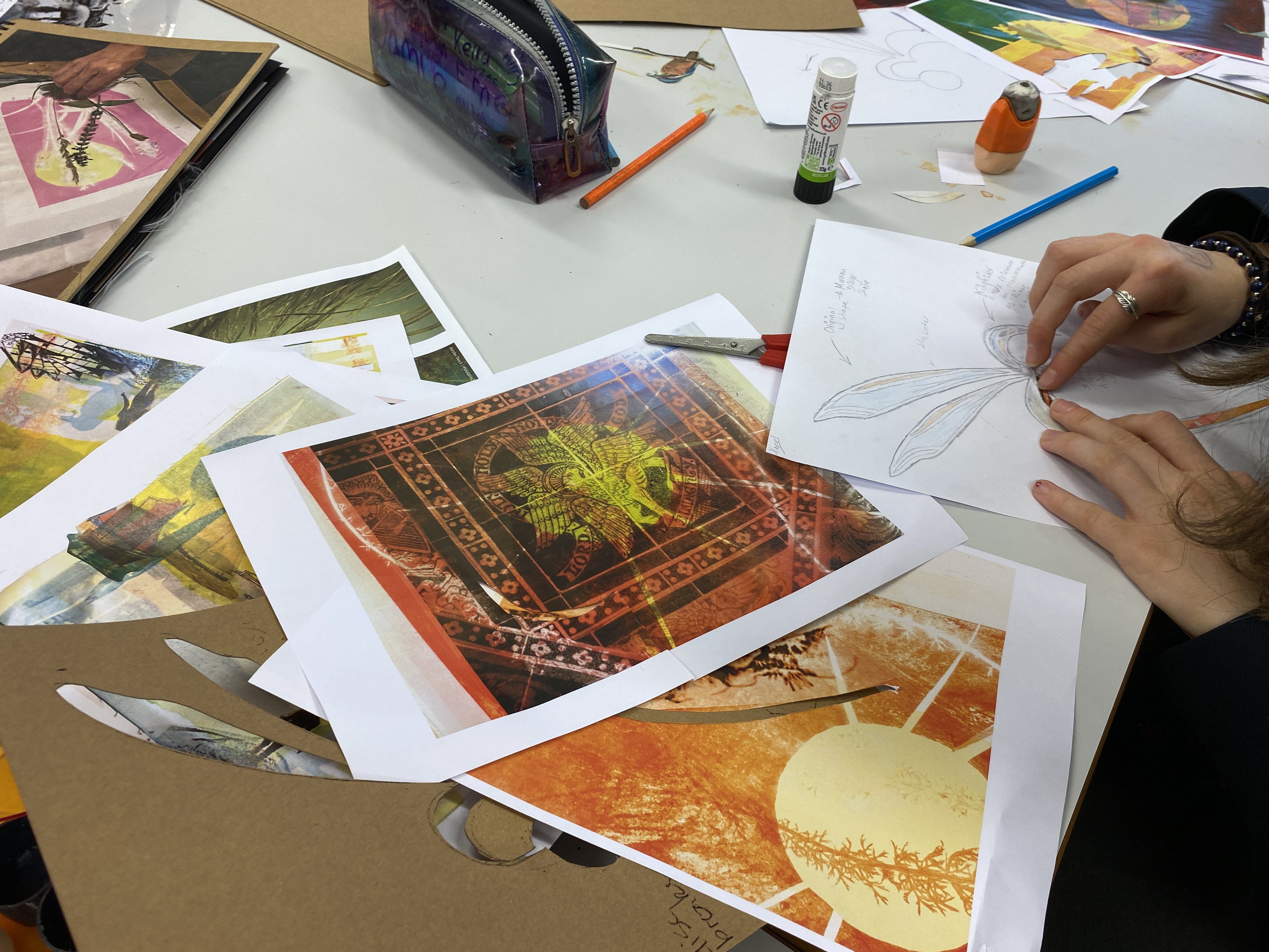 pupils collaging images for a design of a sculpture