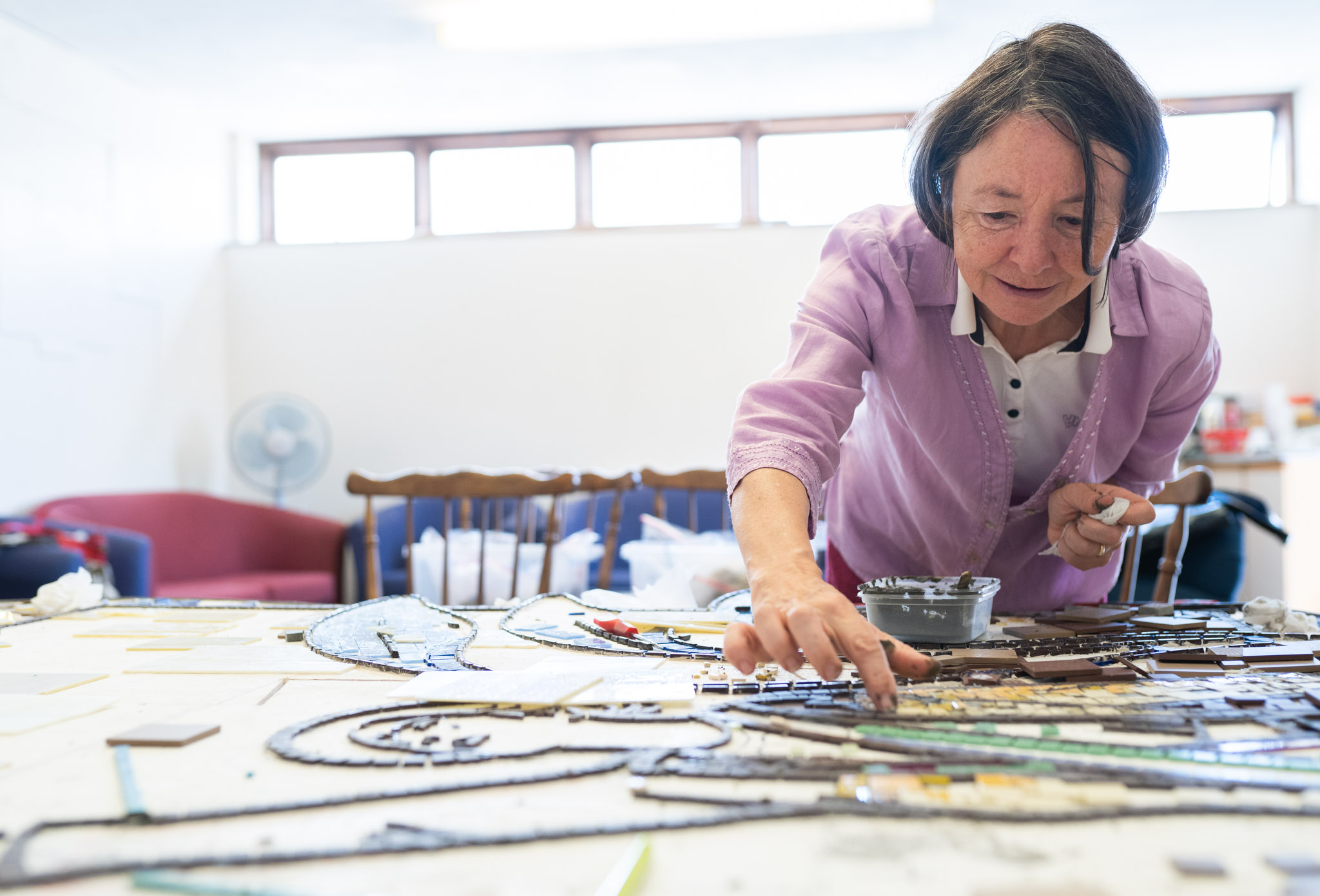 lady making a mosaic