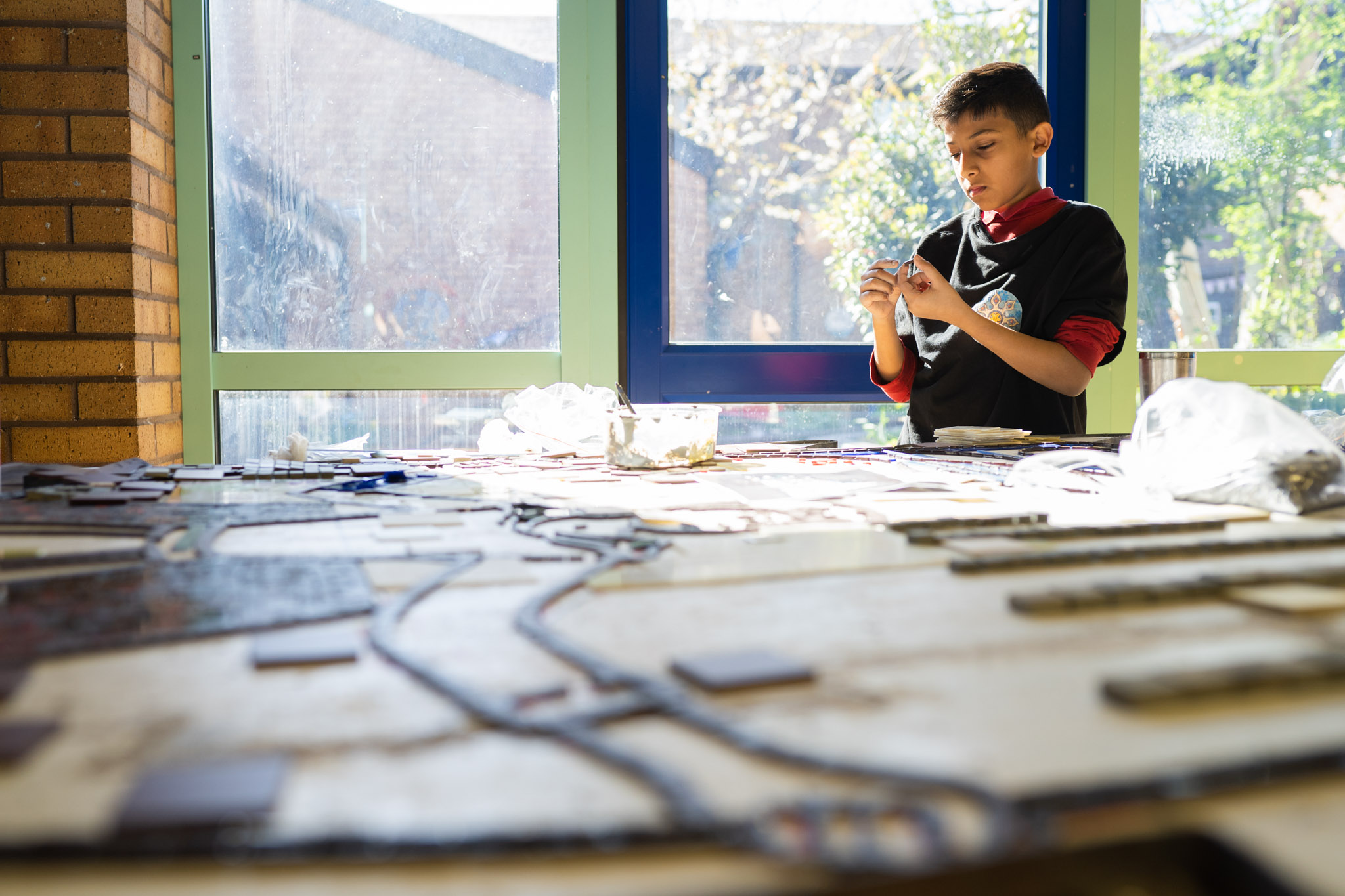 boy making a mosaic