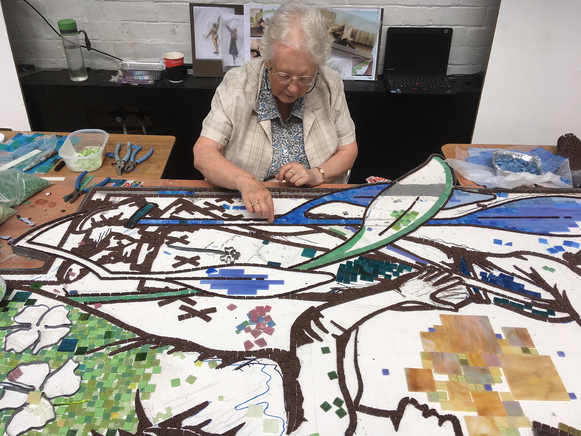 women making a mosaic