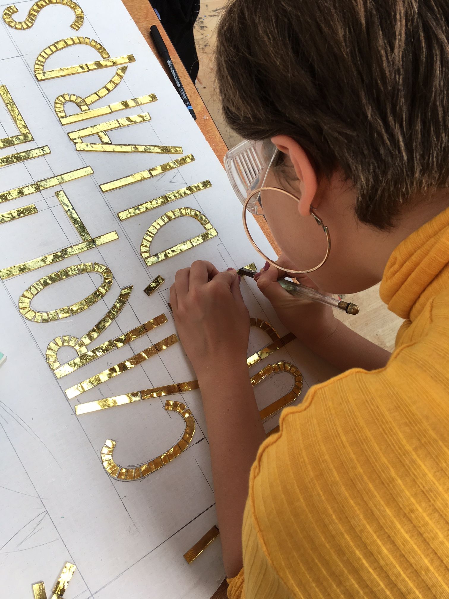 girl making a mosaic