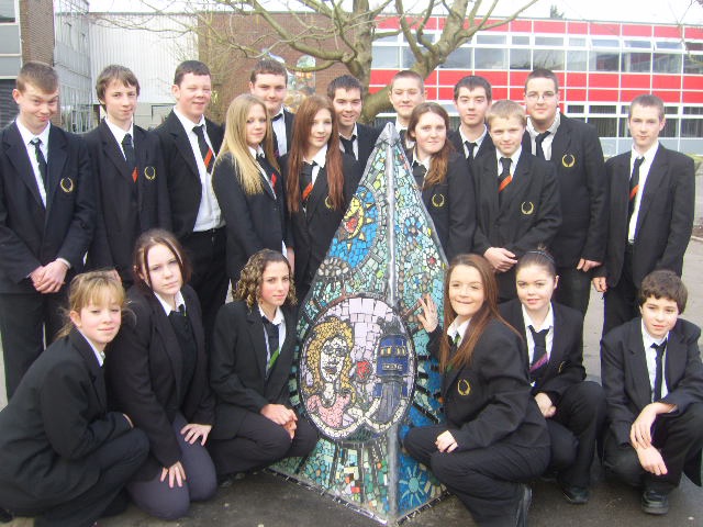 proud pupils with their mosaic about healthy living