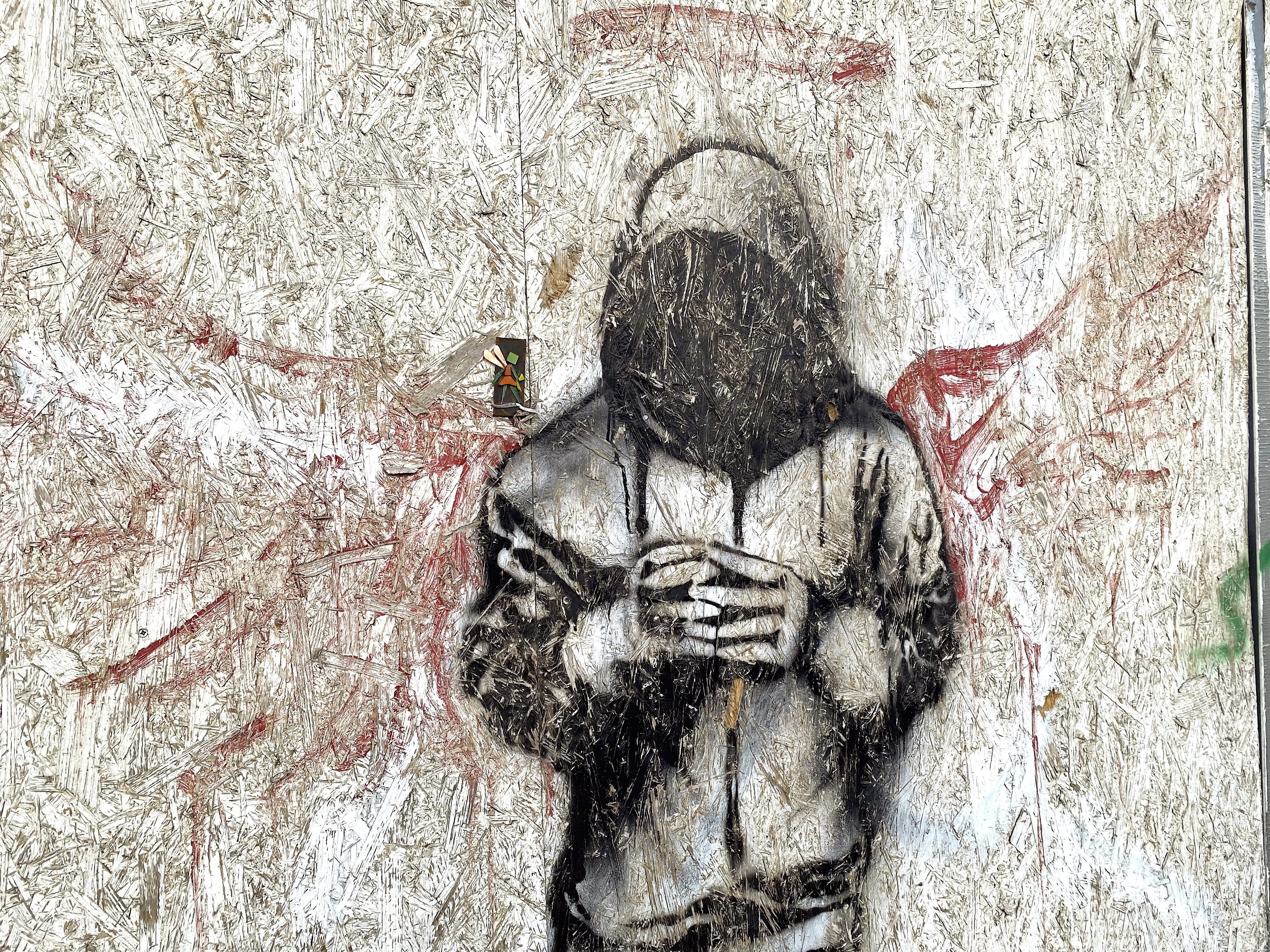 spray paint of a man as an angel with a#streetfairy on his shoulder